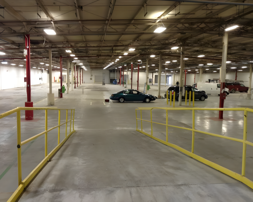 Heavy-duty floor repair and epoxy coating for manufacturing plant.