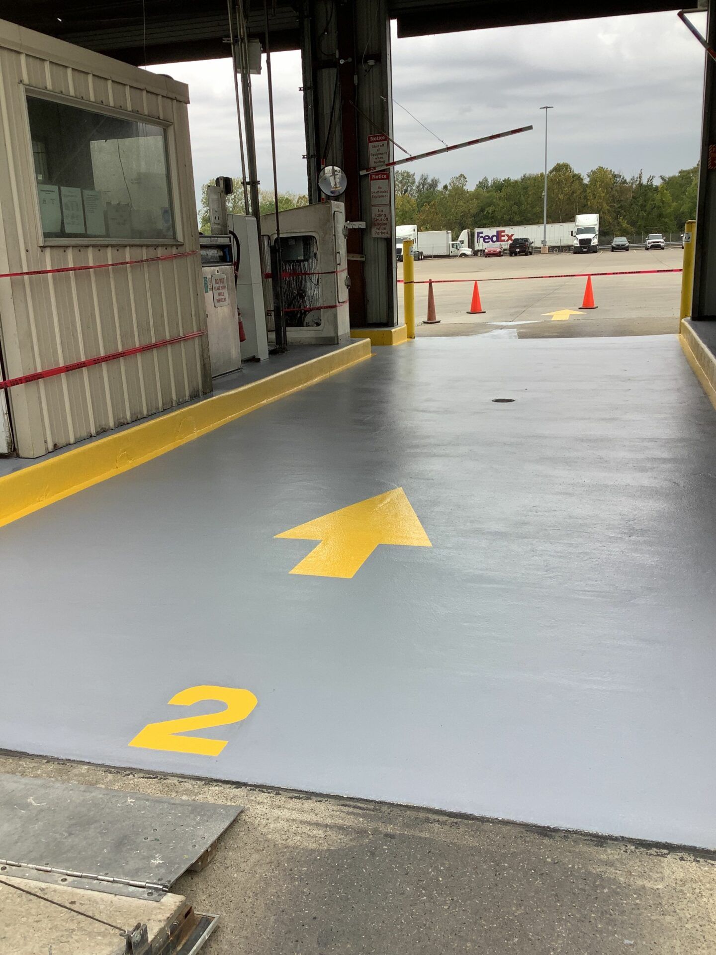 Swift floor rejuvenation at Walmart Distribution Center fuel island.