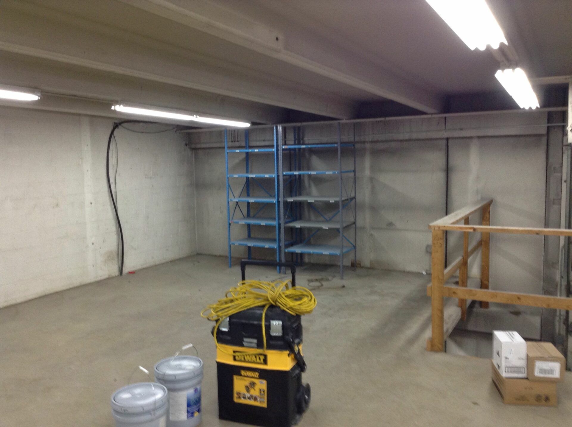 Modern commercial space with clear non-slip epoxy flooring and fresh painted walls.